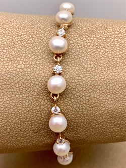 *Браслет р.18  д.6-6,5 Белый Жемчуг цв Красное арт. 5.0101.9.b-162 Вес 9,19 г - фото 310129 *Браслет р.18  д.6-6,5 Белый Жемчуг цв Красное арт. 5.0101.9.b-162 Вес 9,19 г - фото 310129